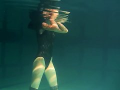 Slim Raven-haired Cutie Undresses While Diving Inside Of A Pool Porn Videos